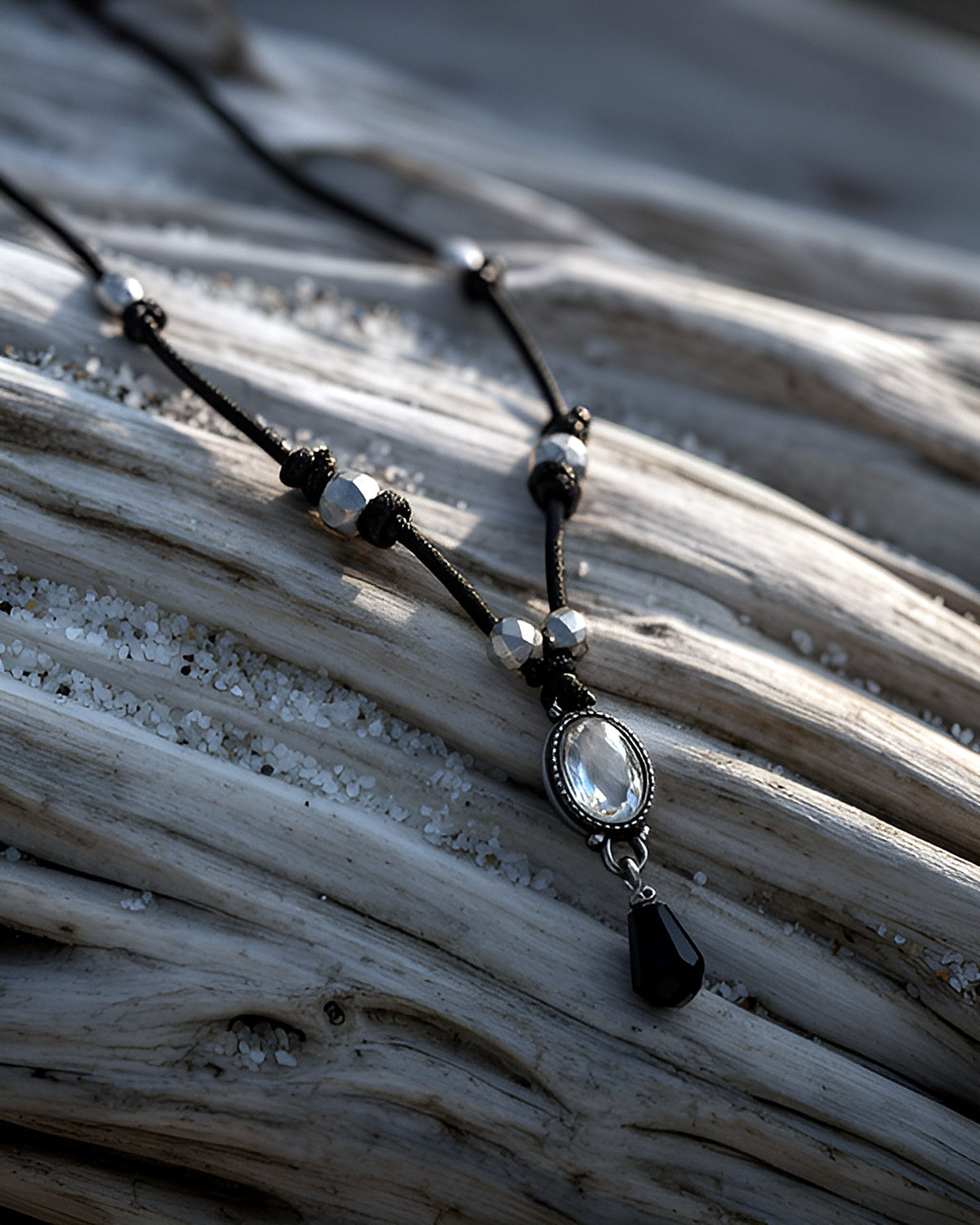NK-03 clear crystal y-necklace — on driftwood