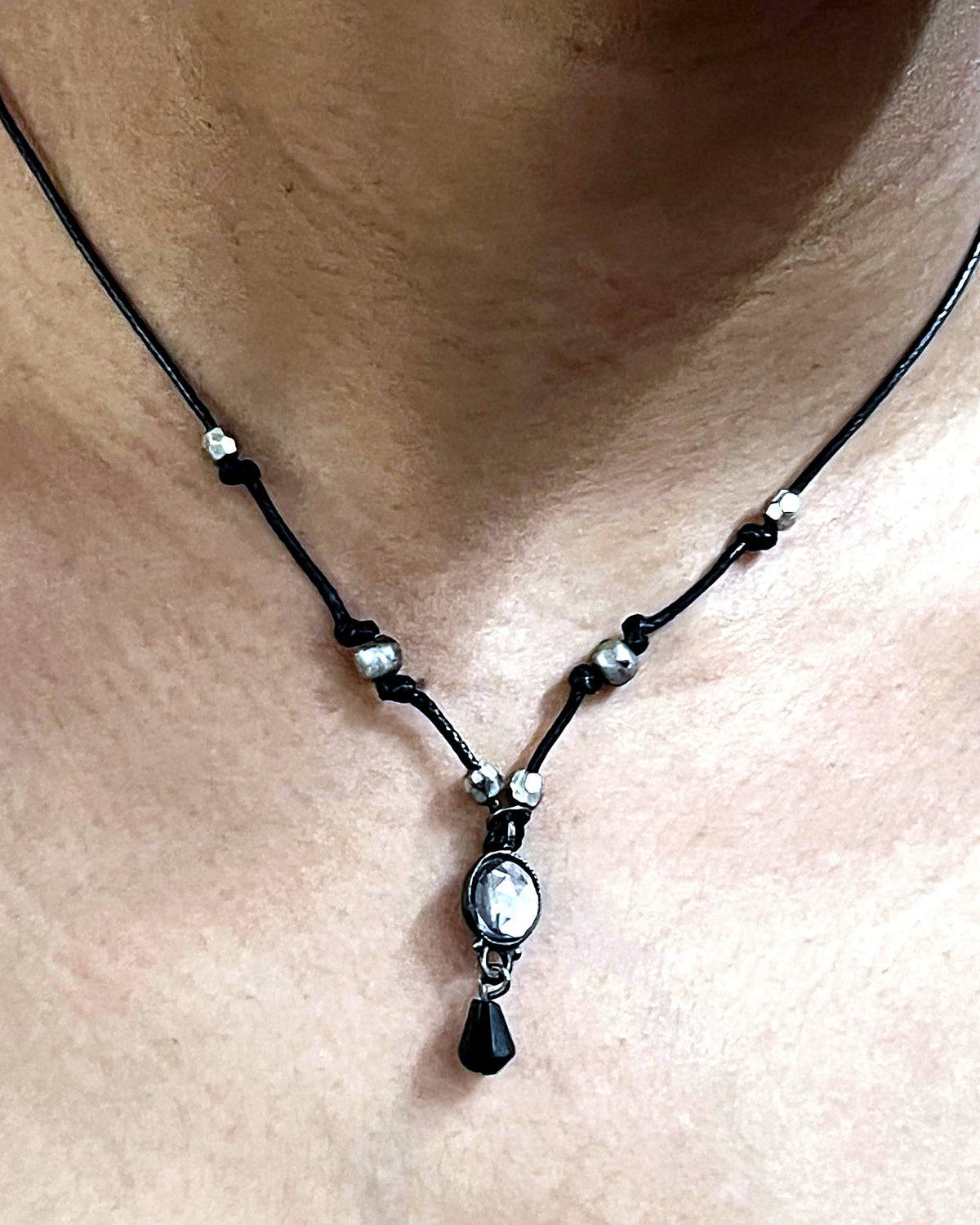 NK-03 clear crystal y-necklace — the actual piece, worn
